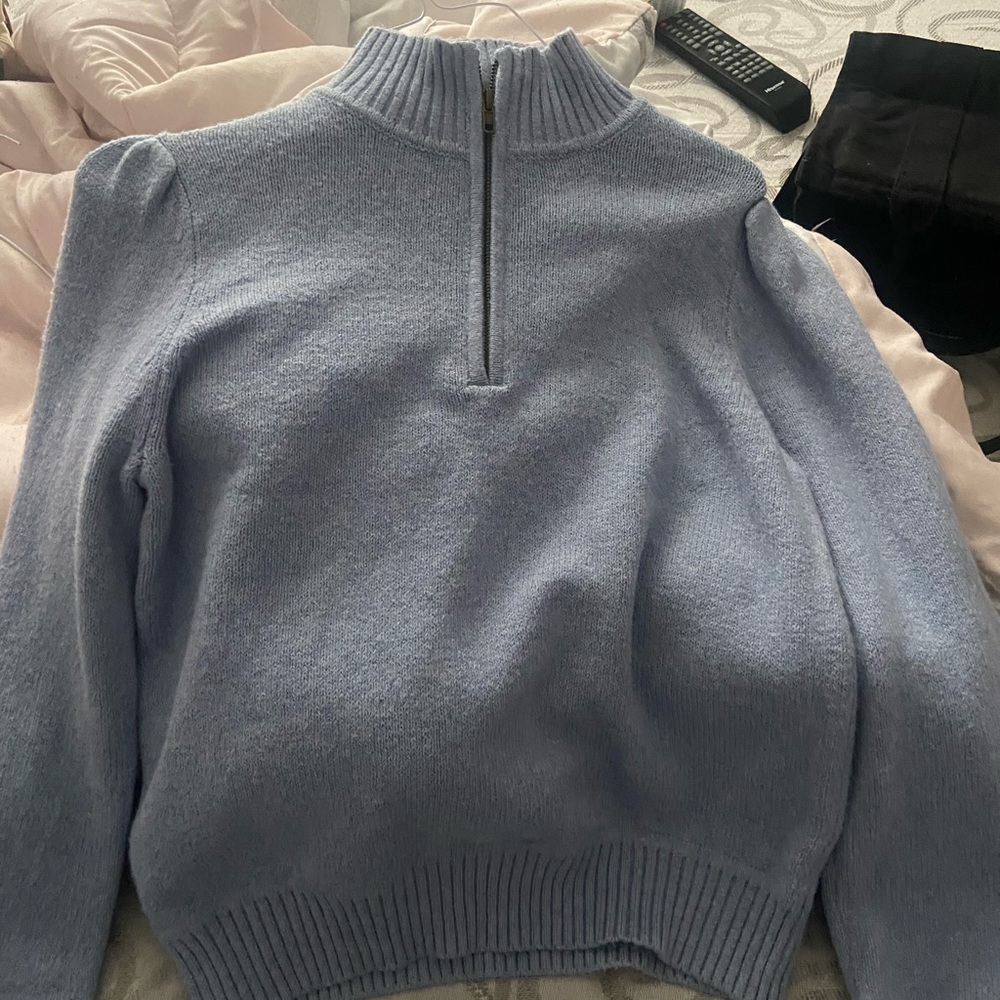 light blue turtle neck sweater